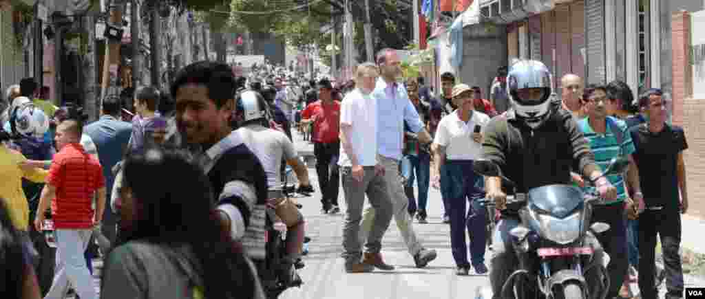 People move towards open space at Redcross Marg, Kathmandu after a 7.4 magnitude earthquake struck Kathmandu again at 12:54 pm, Tuesday, May 12, 2015.
