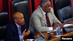 FILE - Ethiopian Defense Minister Siraj Fergessa (left) and House Speaker Abadula Gemeda address legislators at a meeting in Addis Ababa to lift the national state of emergency, Aug. 4, 2017.