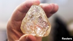 A 709-carat diamond, found in Sierra Leone and known as the "Peace Diamond", is displayed during a tour ahead of its auction, at Israel's Diamond Exchange, in Ramat Gan, Israel, Oct. 19, 2017. (REUTERS/Nir Elias)