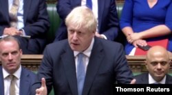 PM Inggris Boris Johnson saat berpidato di hadapan anggota parlemen Inggris di London, 24 Juli 2019.