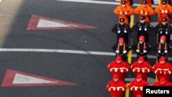 Romanian troops march during a military parade to celebrate Romania's National Day in Bucharest December 1, 2013.