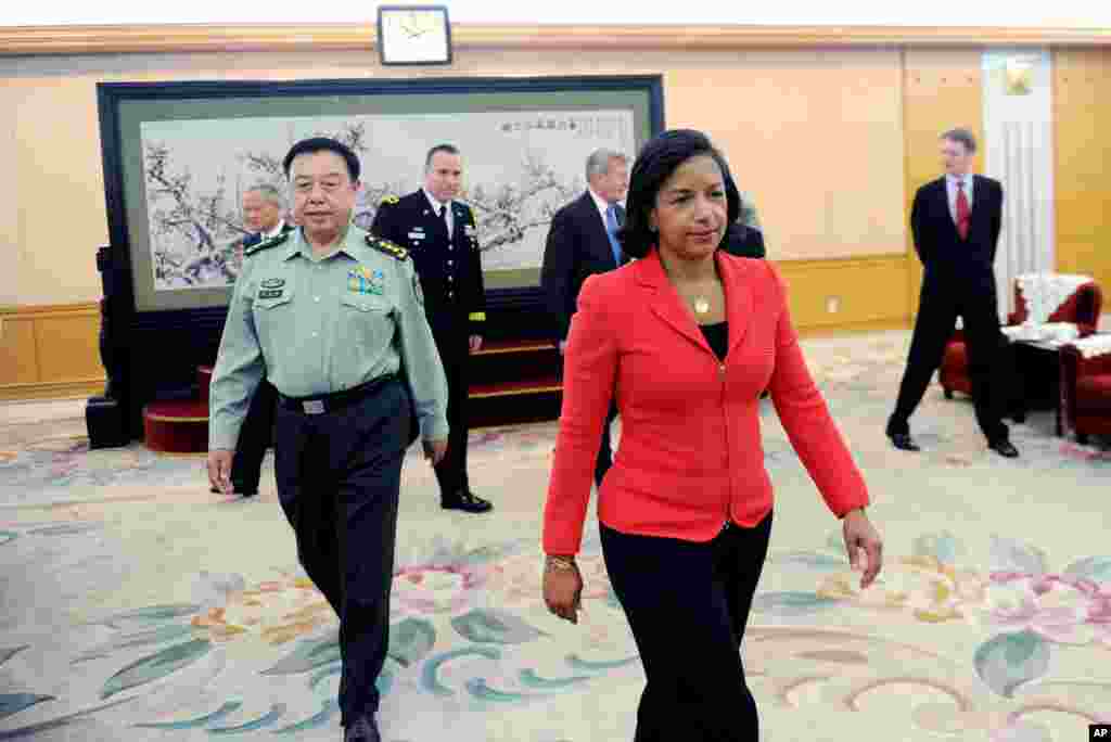 U.S. National Security Adviser Susan Rice walks with Fang Changlong, vice chairman of the Central Military Commission at Bayi Building, in Beijing, Sept. 9, 2014.
