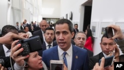 Venezuela's opposition leader Juan Guaido speaks to journalists during a regional counter-terrorism meeting at the police academy in Bogota, Colombia, Jan. 20, 2020