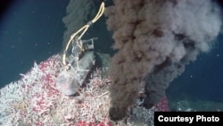 A hydrothermal vent emits jet-black smoke. This material is usually made of minerals that solidify and form chimneys on the sea floor. However, hydrogen can also be a byproduct of vents. (Photo courtesy of National Oceanic and Atmospheric Administration) 