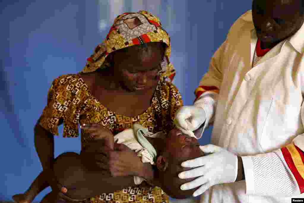 A child rescued from Boko Haram in Sambisa forest is attended to at a clinic at the Internally Displaced People's camp in Yola, May 3, 2015.