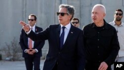 Ентони Блинкен (лево), Јоав Галант (десно)