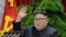 This picture taken during the period of December 28 to December 31, 2019 and released from North Korea's official Korean Central News Agency (KCNA) on January 1, 2020 shows North Korean leader Kim Jong Un attending a session of the 5th Plenary…