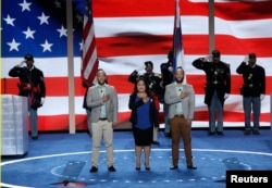 FILE - Newly naturalized U.S. citizens lead the U.S. Pledge of Allegiance at the start of the final day of the Democratic National Convention in Philadelphia, Pennsylvania, July 28, 2016.