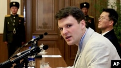 FILE - American student Otto Warmbier speaks as he is presented to reporters in Pyongyang, North Korea.