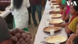 Des femmes en Inde lors d'un concours de nourriture