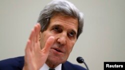 U.S. Secretary of State John Kerry testifies on agreements over Iran's nuclear program, before the House Foreign Affairs Committee on Capitol Hill in Washington, Dec. 10, 2013.