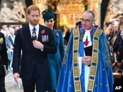 Catherine, The Duchess of Cambridge and Prince Harry at the ANZAC Dawn Service held at Westminster Abbey, London.