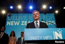 New Zealand Prime Minister Bill English speaks to supporters during an election night event in Auckland, New Zealand, Sept. 23, 2017.
