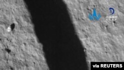 An image taken by the Chang'e 5 spacecraft after its landing on the moon is seen in this handout provided by China National Space Administration.