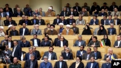 Iranian officials listen to speech of supreme leader Ayatollah Ali Khamenei during a conference titled "international conference in support of Palestinian Intifada" in Tehran, Iran, Feb. 21, 2017.