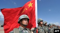 资料照：中国军队参加上海合作组织在吉尔吉斯斯坦举行的反恐联合军演。（2016年9月19日）