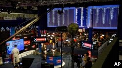 South African television channels report results as they come in from the Independent Electoral Commission Results Center in Pretoria, South Africa, May 9, 2019.