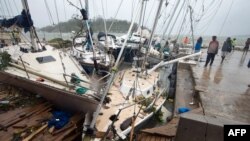 Kapal rusak akibat Siklon Pam di ibukota Vanuatu, Port Vila, 14 Maret 2015. (AFP PHOTO/UNICEF Pacific)