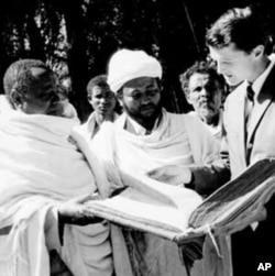 McCaskey reviews ancient scrolls with church elders in Ethiopia