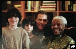 Nelson Mandela is godfather to both of the author's sons.
