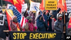 FILE - A group from the Tigrayan diaspora in North America protest about the conflict in Ethiopia, near the State Department, on Dec. 22, 2021, in Washington.