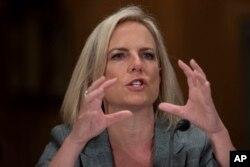 FILE - Homeland Security Secretary Kirstjen Nielsen testifies before the Senate Committee on Homeland Security & Governmental Affairs, on Capitol Hill, Oct. 10, 2018, in Washington.