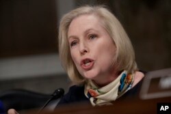 Sen. Kirsten Gillibrand, D-N.Y., questions Marine Gen. Robert B. Neller, the commandant of the Marine Corps, at a Senate Armed Services Committee hearing on the investigation of nude photographs of female Marines and other women that were shared on the Facebook page "Marines United," on Capitol Hill in Washington, March, 14, 2017.