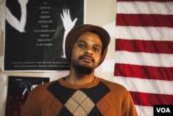 Musician and co-founder of Union Arts D.C. Luke Stewart is at the front of the community movement to “Save Union Arts” and preserve low-cost studio space for young artists and musicians, April 3, 2016. (A. Hernandez/VOA)