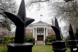 A metal fence surrounds the residence of Russia's consul general, March 26, 2018, in Seattle.