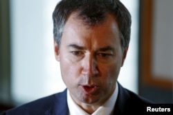 Australia's Minister for Justice, Michael Keenan speaks during an interview with Reuters in Bangkok, Thailand, Jan. 23, 2016.