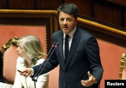 FILE - Italian Prime Minister Matteo Renzi, addressing Italian lawmakers in Rome, April 22, 2015.