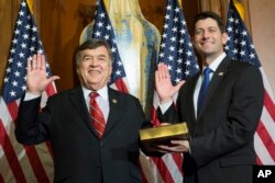 House Speaker Paul Ryan of Wis. administers the House oath of office to Rep. Dutch Ruppersberger, D-Md., during a mock swearing in ceremony on Capitol Hill in Washington, Tuesday, Jan. 3, 2017.