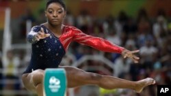 United States' Simone Biles performs on the balance beam at the 2016 Summer Olympics in Rio de Janeiro, Brazil, Aug. 7, 2016.