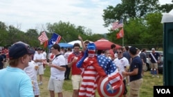Fans dressed up and were ready to cheer on Team USA at RFK stadium in Washington, D.C., June 3, 2013. (Photo: Parke Brewer / VOA)