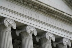 FILE - This May 4, 2021, photo shows the Treasury Building in Washington.