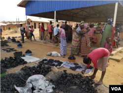 Burundian Refugees in selling charcoal in Mahama Refugee camp in Rwanda.