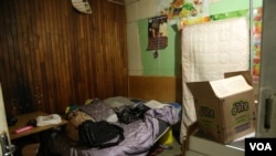 A bedroom for several people who have sought refuge is seen at the church, Johannesburg, South Africa, May 8, 2015. (Gillian Parker/VOA)