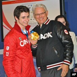 From left: Scott Moir, British Columbia Premier Gordon Campbell and Tessa Virtue