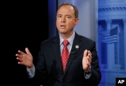 FILE - Rep. Adam Schiff, D-Calf., answers questions during an interview at the Associated Press bureau in Washington, Nov. 7, 2017.