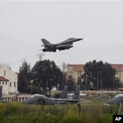 A Danish F-16 aircraft takes off from the NATO airbase in Sigonella, on the southern Italian Sicily island, March 20, 2011
