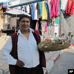 Jasmine seller Kmais at Sidi Bou Said