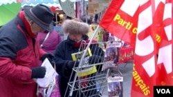 Members of France's Communist party are seen in Suresnes, a former leftist stronghold that is now solidly on the right. (L. Bryant/VOA)