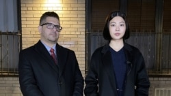 A Thai student, Bew Jirajariyawetch (R), and her attorney, Eric Parnes (L) speak out with VOA Thai following the attack at the Herald Square subway platform.
