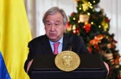 FILE - U.N. Secretary-General Antonio Guterres talks to the media during a press conference at Nariño presidential palace in Bogota, Nov. 24, 2021.