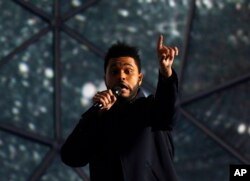 The Weekend performs, during the MTV European Music Awards 2016, in Rotterdam, Netherlands, Nov. 6, 2016.