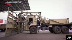 This photo from Moscow, provided by the Kalashnikov company Aug. 29 2017, shows another view of the firm's crowd control vehicle called the Shchit (Shield).