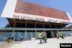 Construction workers are seen during the renovation project of Somalia's National Theatre in Mogadishu, Somalia February 3, 2019. Picture taken February 3, 2019.