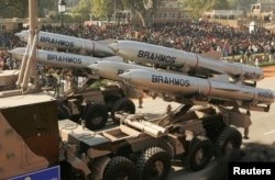 FILE - India's Brahmos supersonic cruise missiles, mounted on a truck, pass by during a full dress rehearsal for the Republic Day parade in New Delhi, January 23, 2006.