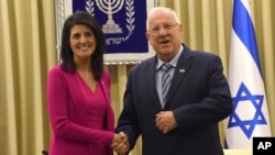 FILE - U.S. Ambassador to the United Nations Nikki Haley meets Israeli President Reuven Rivlin in his residence in Jerusalem, Israel, June 7, 2017.