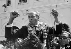 FILE - Then-chairman of the People's Party and former foreign minister Zulfikar Ali Bhutto is seen after arriving in Karachi in Feb, Pakistan, in Feb. 1969, following three months of imprisonment.
